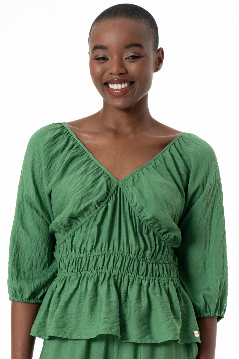 Peplum Silhouette Top