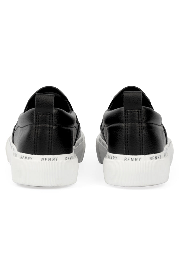 Back View: Subtle heel detail with tonal stitching and pull tab.