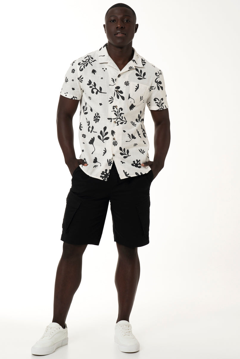 White floral print short sleeve slim fit shirt. This shirt is made out of our crosshatch cotton  which is light and breathable and ensures a comfortable fit.