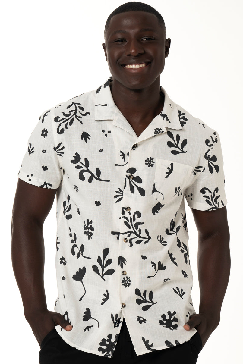 White floral print short sleeve slim fit shirt. This shirt is made out of our crosshatch cotton  which is light and breathable and ensures a comfortable fit.