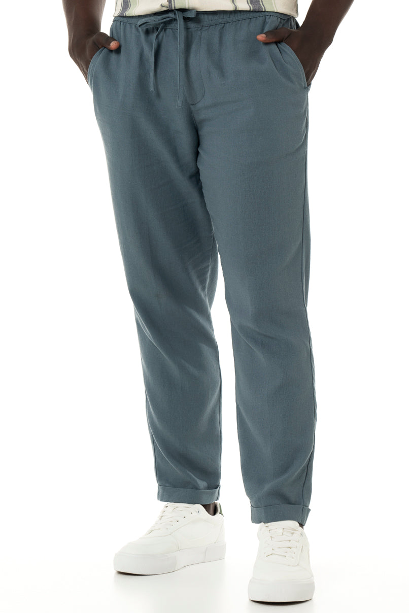 Charcoal linen-look pants with an elasticated waist, which makes them easy to wear.    Drawcord Side pocket detail Back patch pockets 55% Linen; 45% Viscose