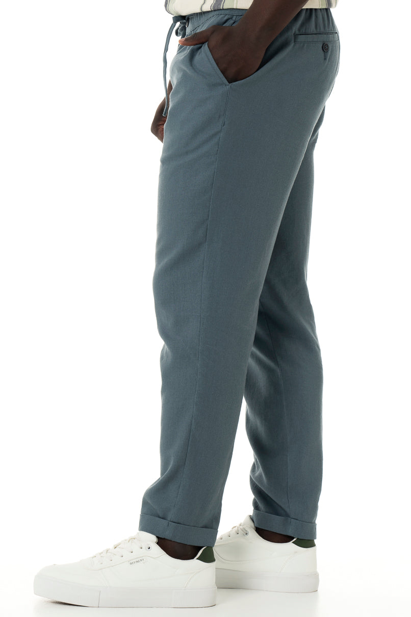 Charcoal linen-look pants with an elasticated waist, which makes them easy to wear.    Drawcord Side pocket detail Back patch pockets 55% Linen; 45% Viscose
